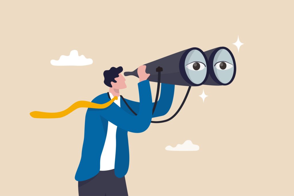 Person in a suit using binoculars, symbolising financial foresight and guidance in loan options.