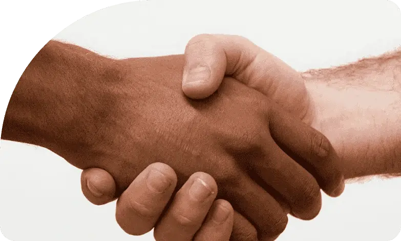 Hands shaking to symbolize partnership and collaboration in financial services, reflecting trust and support in mortgage and loan solutions.